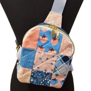 Mav Sling Patchwork Mini Sling Backpack: Ruby Star Society Crossbody Bag